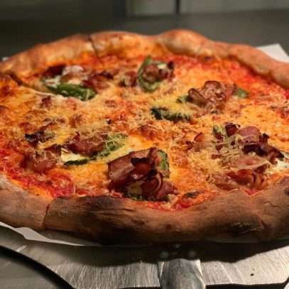 Freewheel Pizza Big Popper- Bacon, Roasted,Spicy Arrabbiata,Jalapeños,Mozz,Smoked Provolone,Micro Cilantro,Clover Honey Drizzle